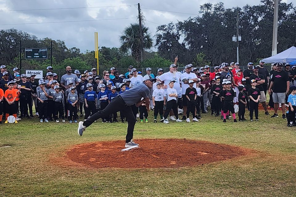 First pitch in the opening season ceremony for haines city little league  baseball.