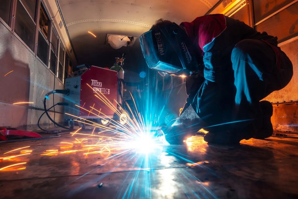 Marquez Welding craftsman welding custom iron gate in Houston shop