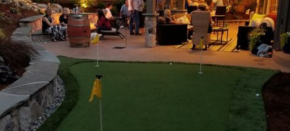 Outdoor space with putting green
