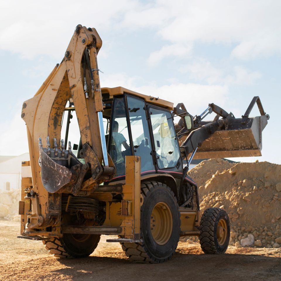 Heavy excavator digging day light