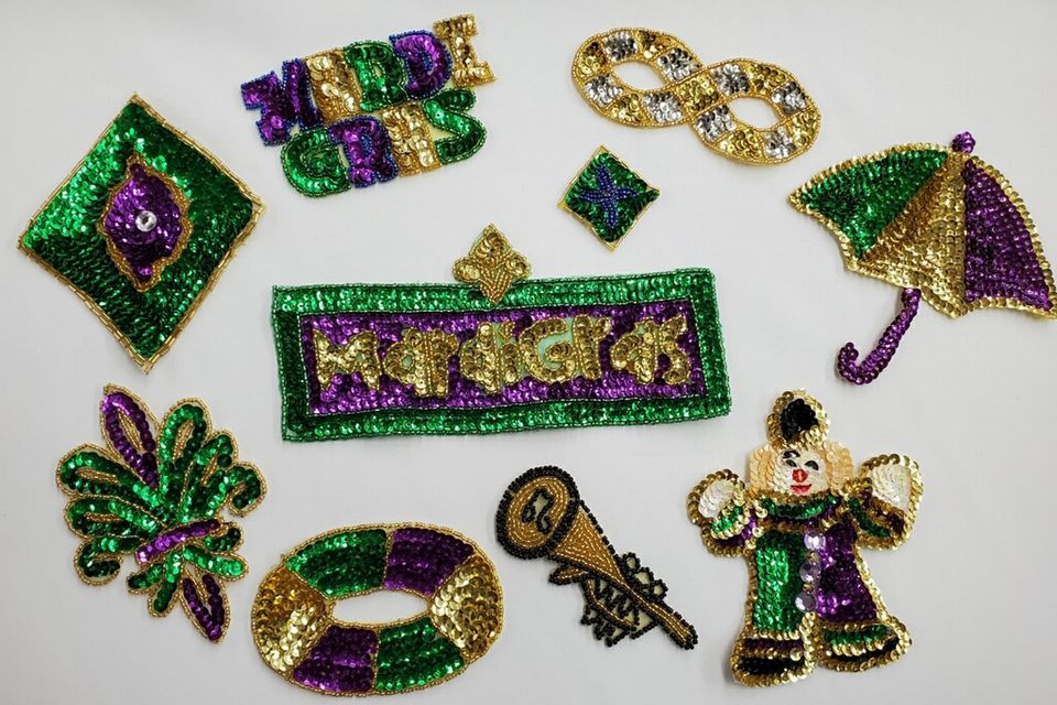 Mardi Gras appliques in purple, green and gold.