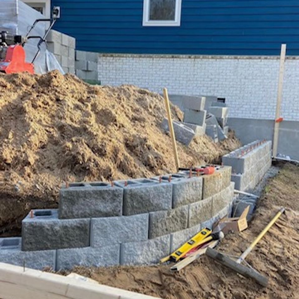 "Decorative breeze block retaining wall constructed by Gabino Landscaping in Myrtle Beach, South Carolina."