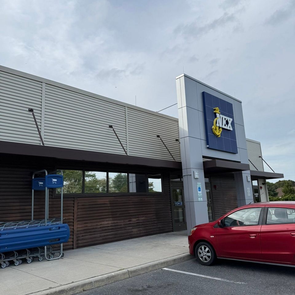 Navy Exchange storefront with large tinted windows and entry doors in Moyock North Carolina