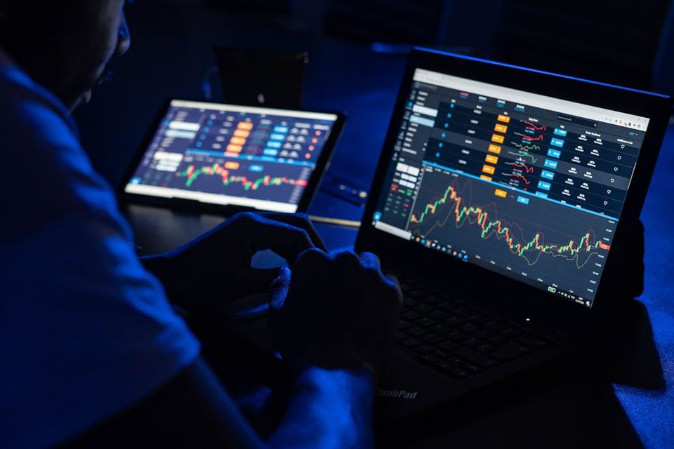 Man watching computer screens