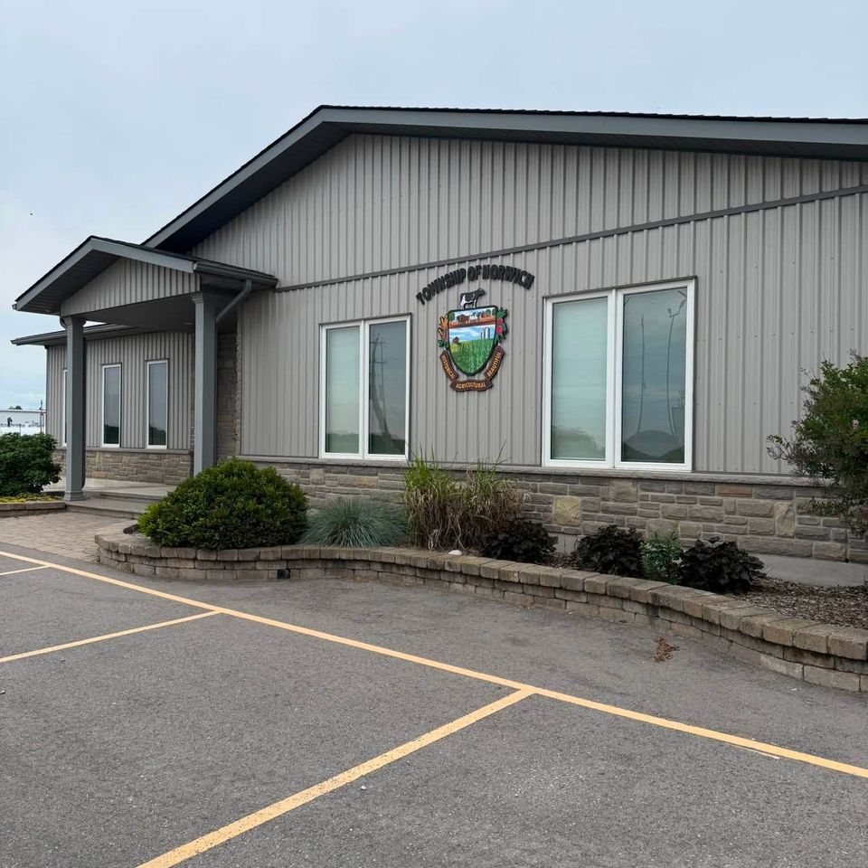 Township of Norwich municipal office with clean gray metal siding and windows after commercial cleaning