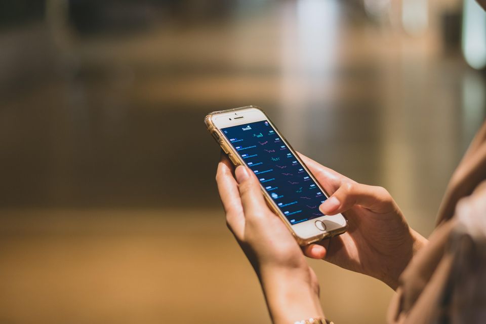 Person on phone trying to identify their target audience for business in Houston, Texas
