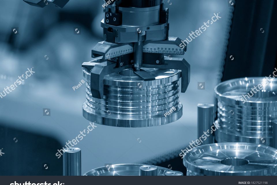 Stock photo the hi technology cnc lathe machine operation with gripping robotic system the cobot operation 1827521198