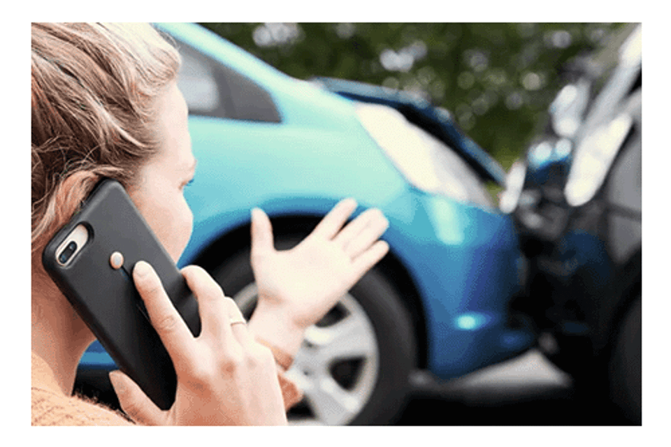Lady on phone after car accident