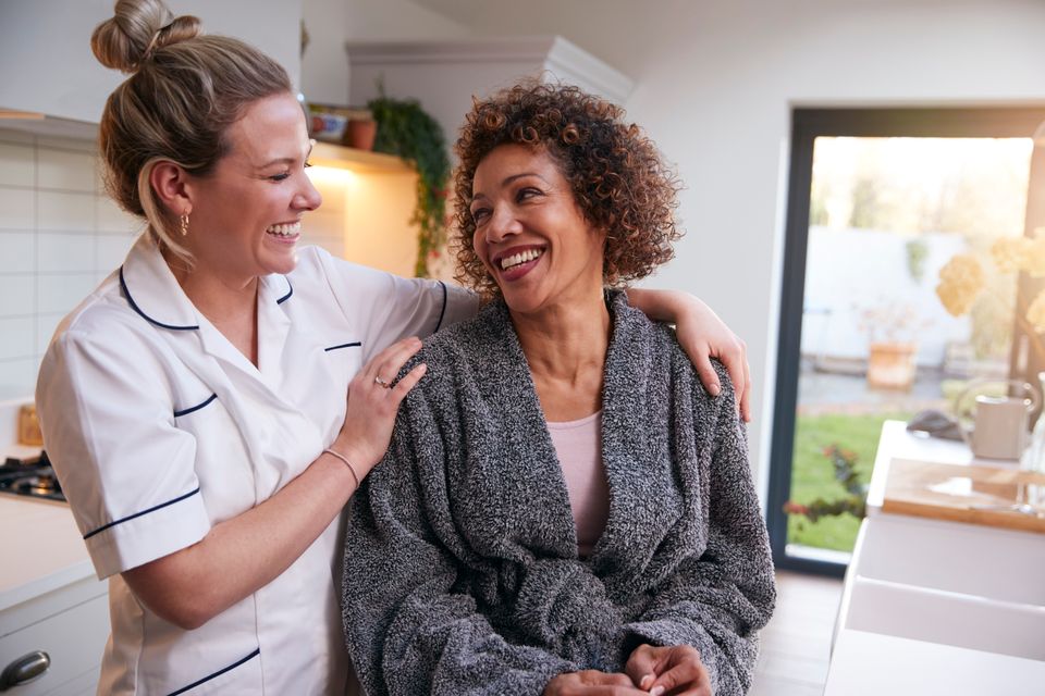 Mature woman in dressing gown talking with female 2023 11 27 05 15 11 utc