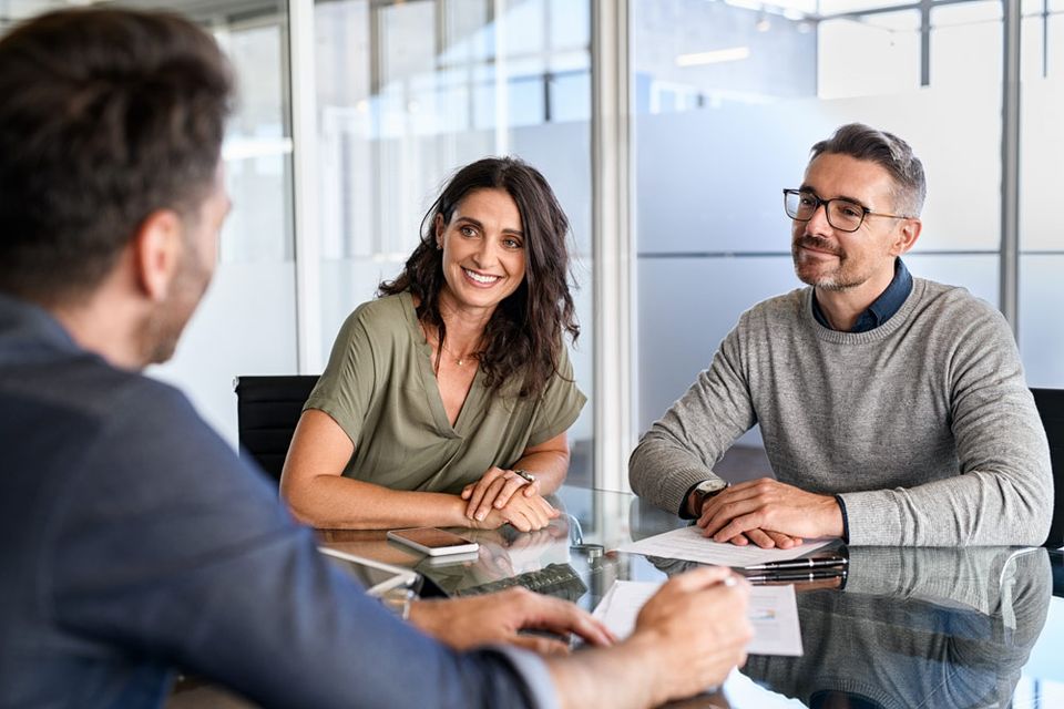 Couple in Business Meeting