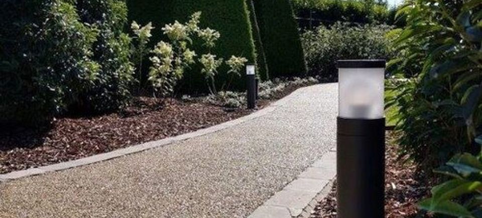 Quartz Carpet by EverStone on a landscaped outdoor walkway.