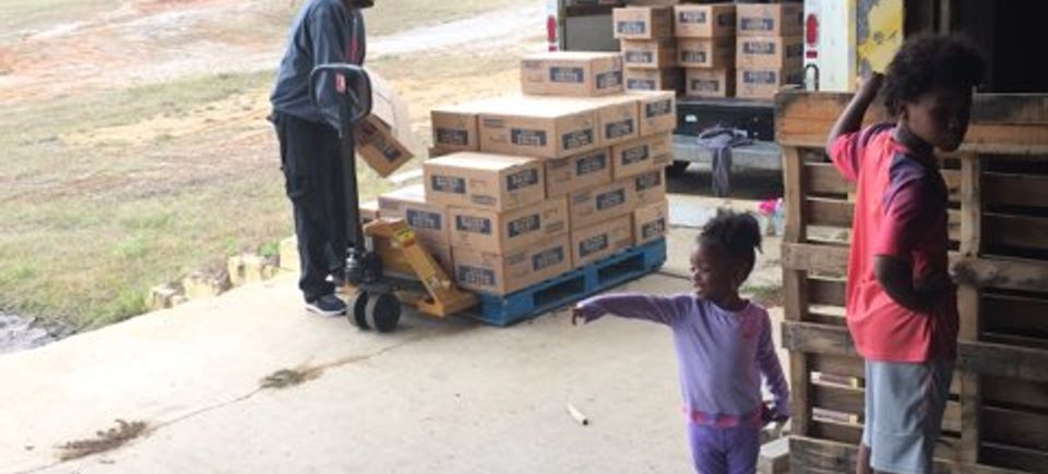 Youth volunteering in the wearhouse