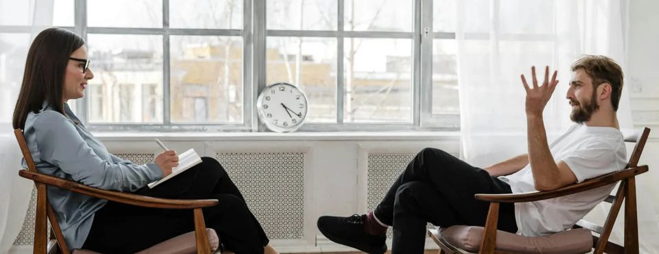 Man and Woman doing Cognitive Behavioral Therapy