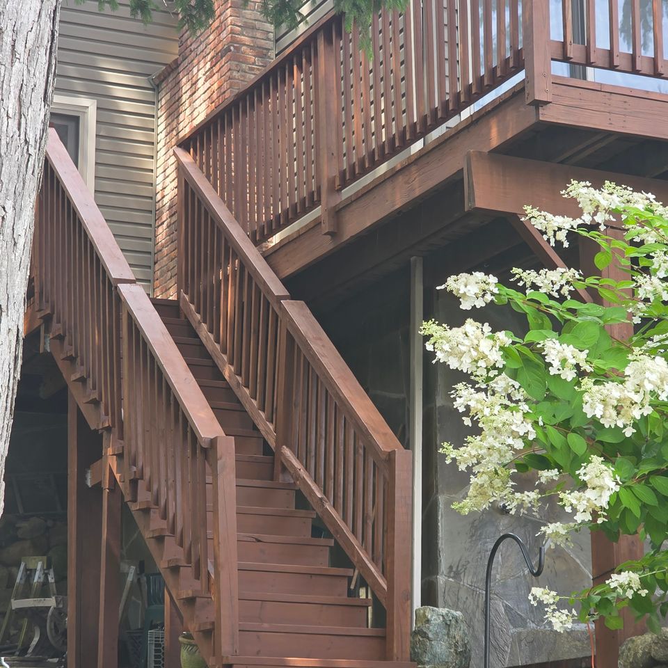 Deck after stain repair power wash trinity