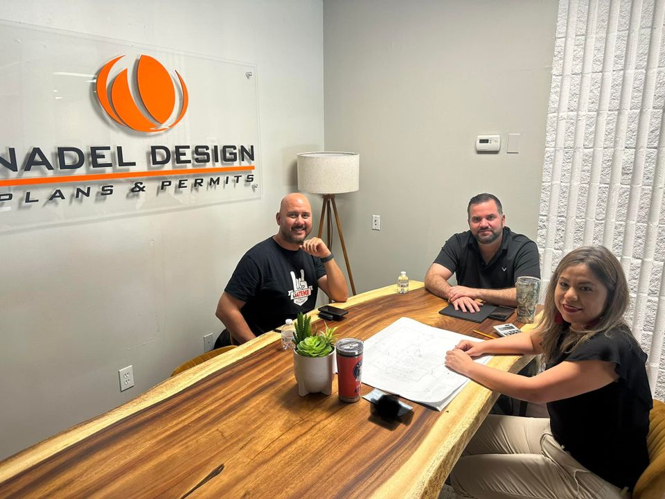 Nadel design   photo of nancy delgado and guests around table