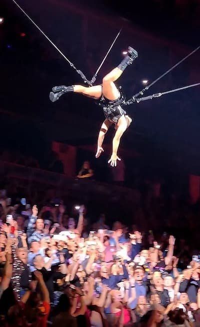PINK buzzing the tower in her cables performing her acrobatics 