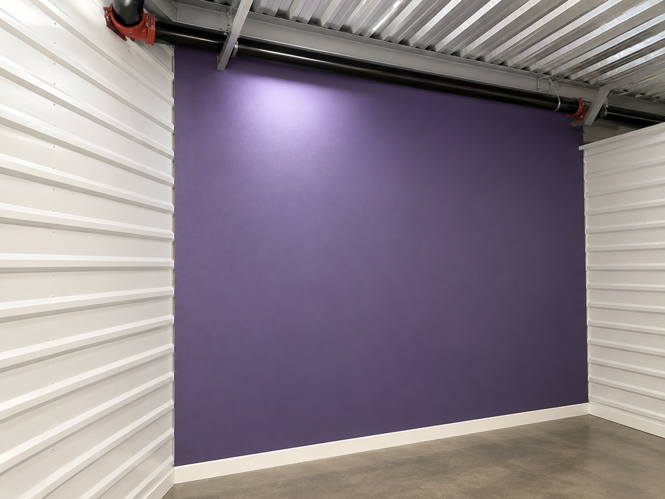 Commercial interior accent wall painted deep purple with a smooth, professional finish by Simply Professional Painting in Parkesburg, PA.