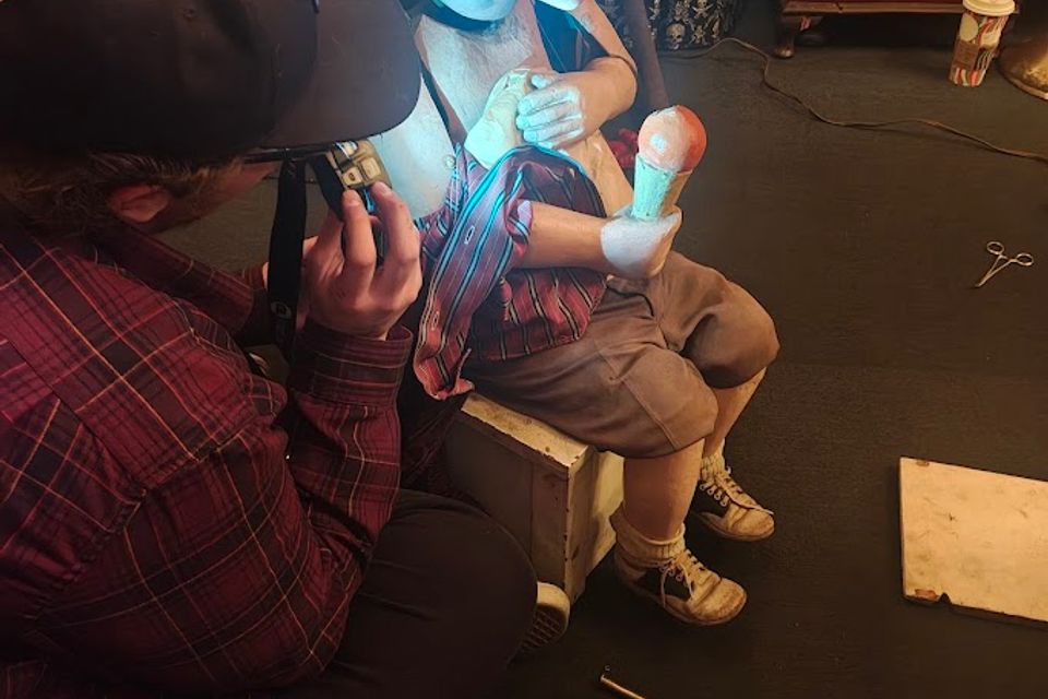 Large porcelin doll w photographer