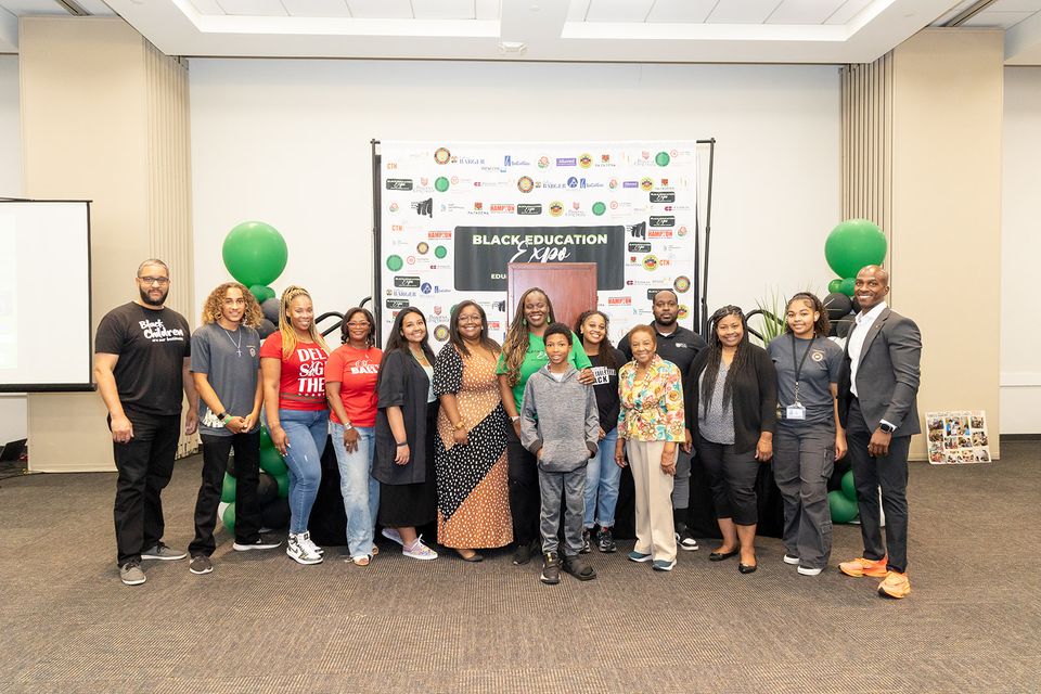Bee sponsors  partners and students victoria williams green shirt councilmember tyron hampton orange shoes