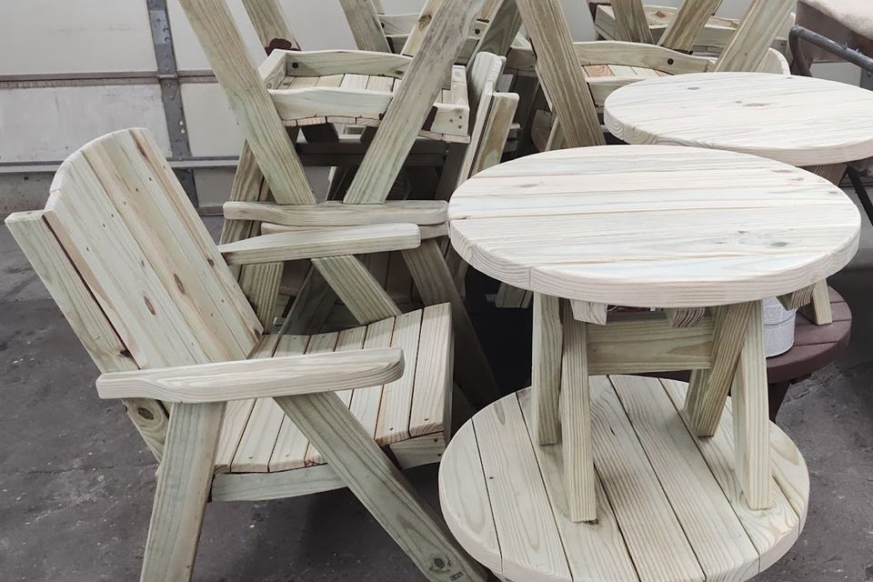 Made  to  order adirondock chairs and small table being assembled pj