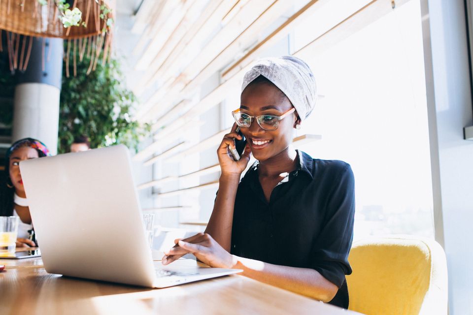 African american business woman with phone min