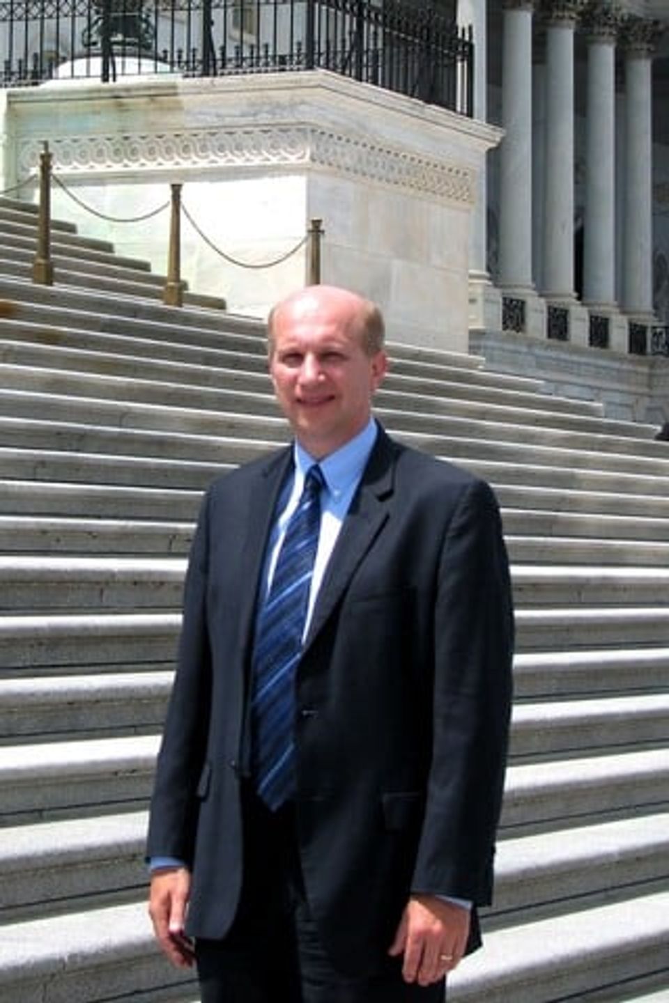Todd Ungerecht Law Office - Todd in front of capital steps