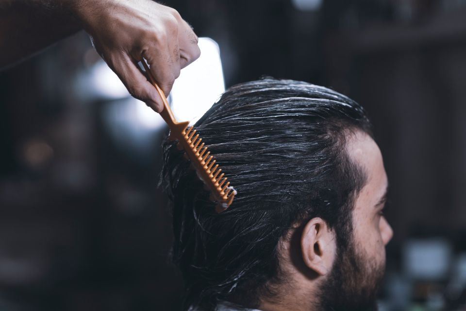 Barber Hair Styling Client in Bronx Barbershop setting