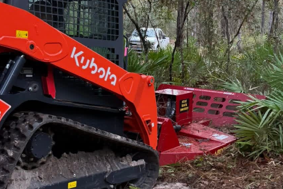 JNJ Hauling using the Kubota to clear land, done in Citrus County Florida
