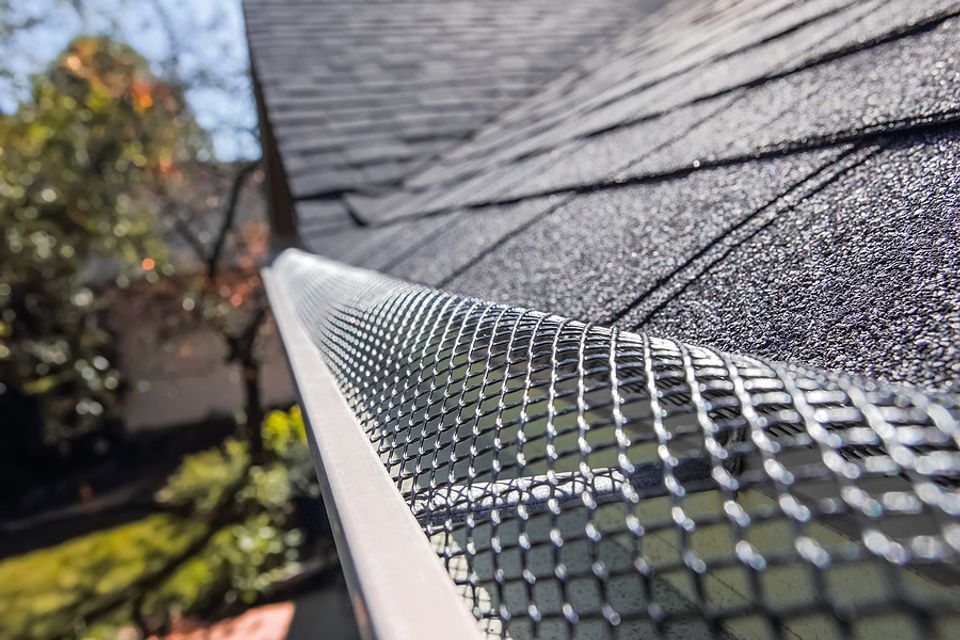 Bigstock plastic guard over gutter on a 418591738