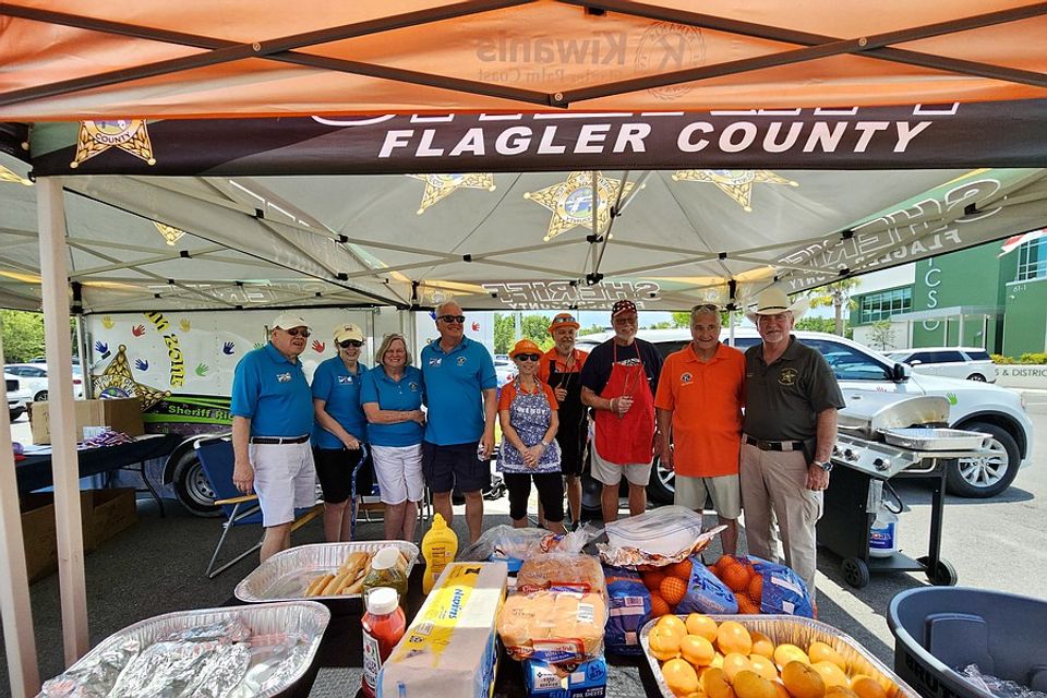 Torch run kiwanis cooks hotdags