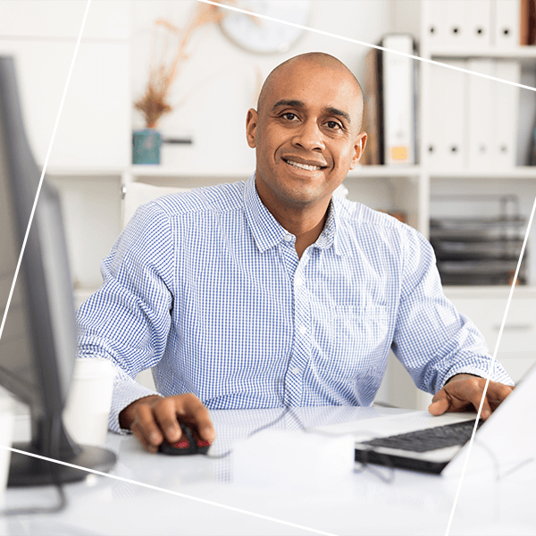Man sitting at his office desk