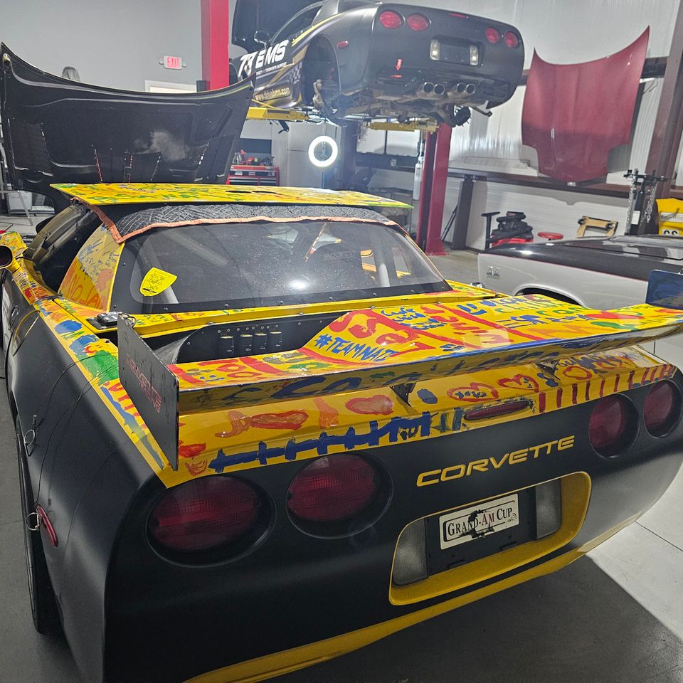 Bennett Motorsports Support mechanics providing track day paddock support and race car prep before a session