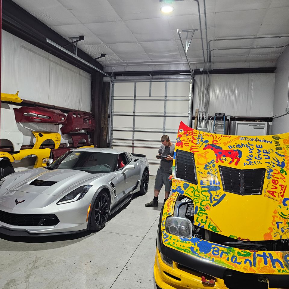 BMS paddock setup highlighting trackside car detailing services, professional washing, and waxing in Wilmington, NC