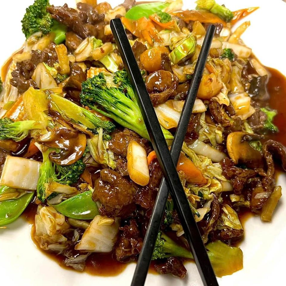 Beef and mixed vegetable stir-fry with broccoli, mushrooms, cabbage, and carrots in savory brown sauce at Little Hunan.