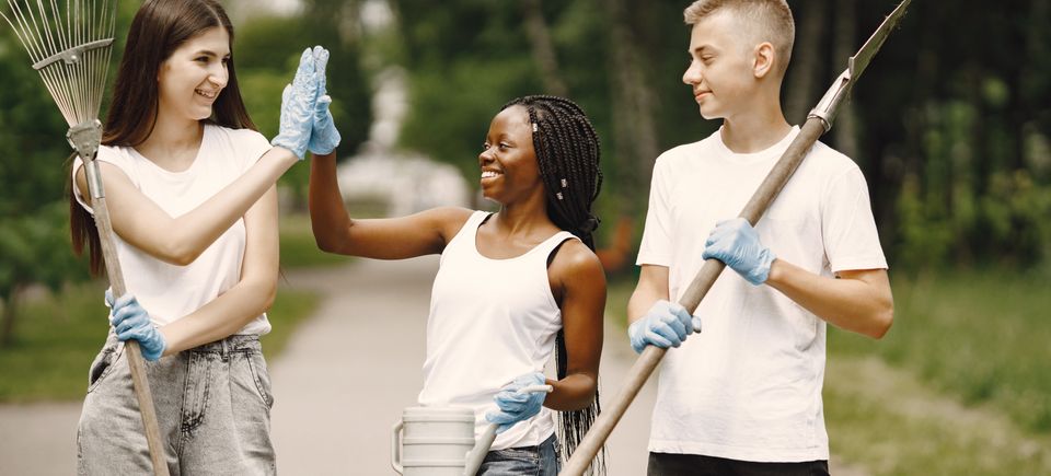 Eco activists teenagers giving high five each othe 2023 11 27 05 29 49 utc