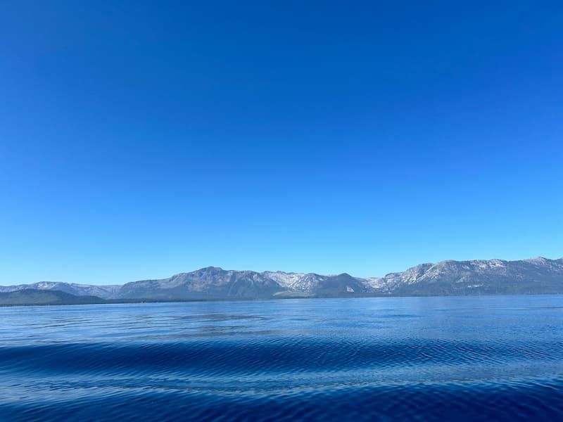 Photo from KPCopy's boat "Believe" of the still water with Mt Tallac in the background 