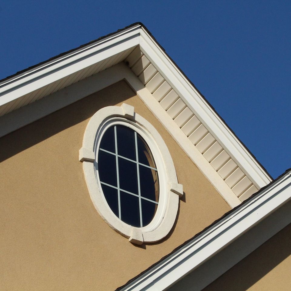 Modern residential home exterior featuring custom cast cement window trim and architectural masonry framing by Roseville Concrete Solutions