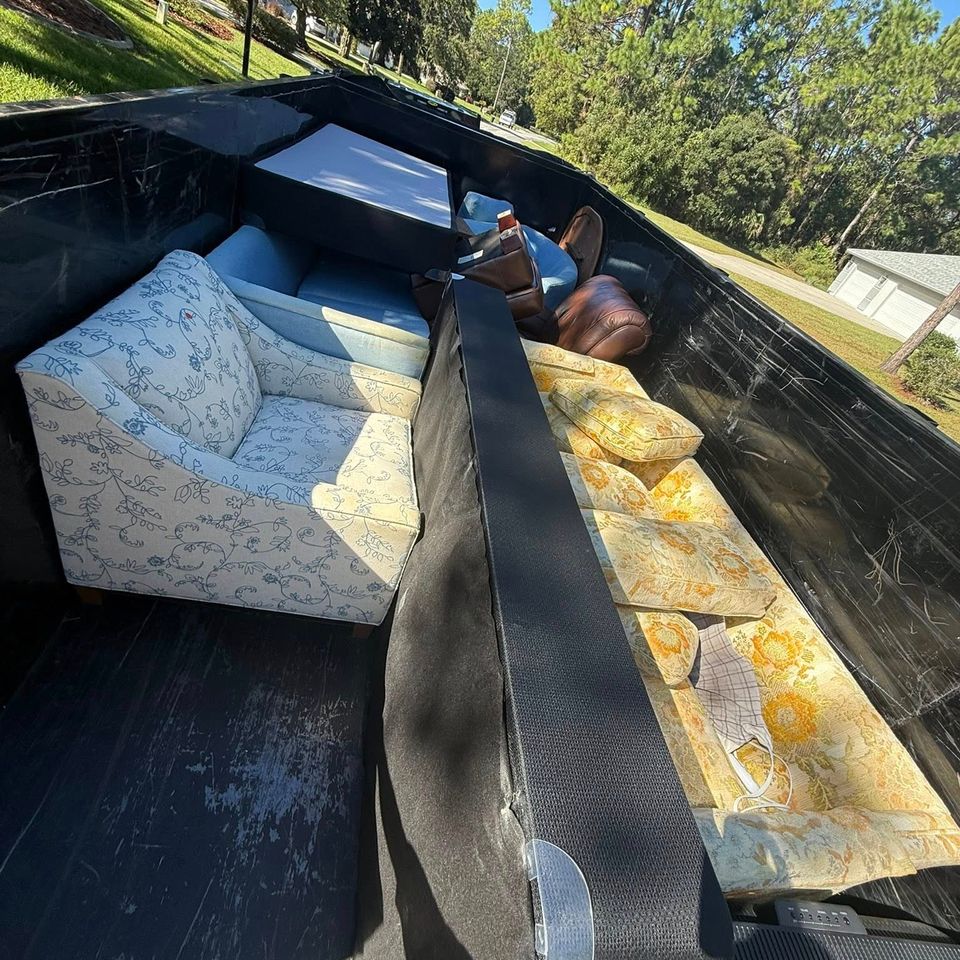 Furniture in the back of the JNJ Hauling Solutions truck