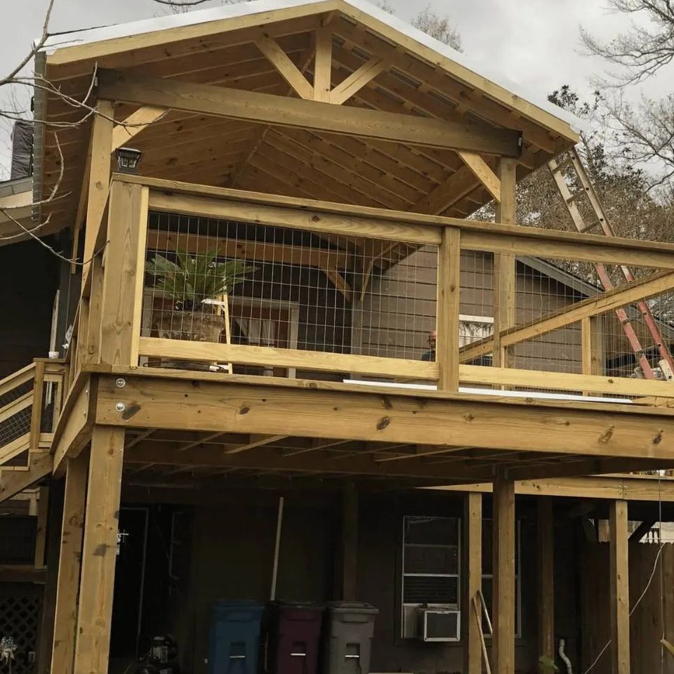 Finished raised deck covered patio outdoor living space built in Spring TX