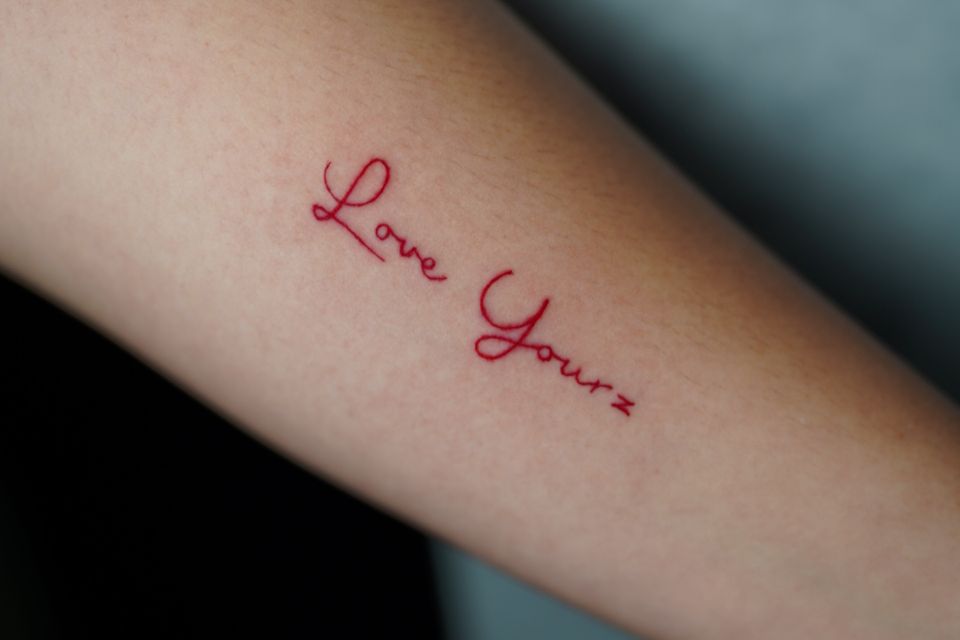 Image of a tattoo with a meaningful message - Love Your z