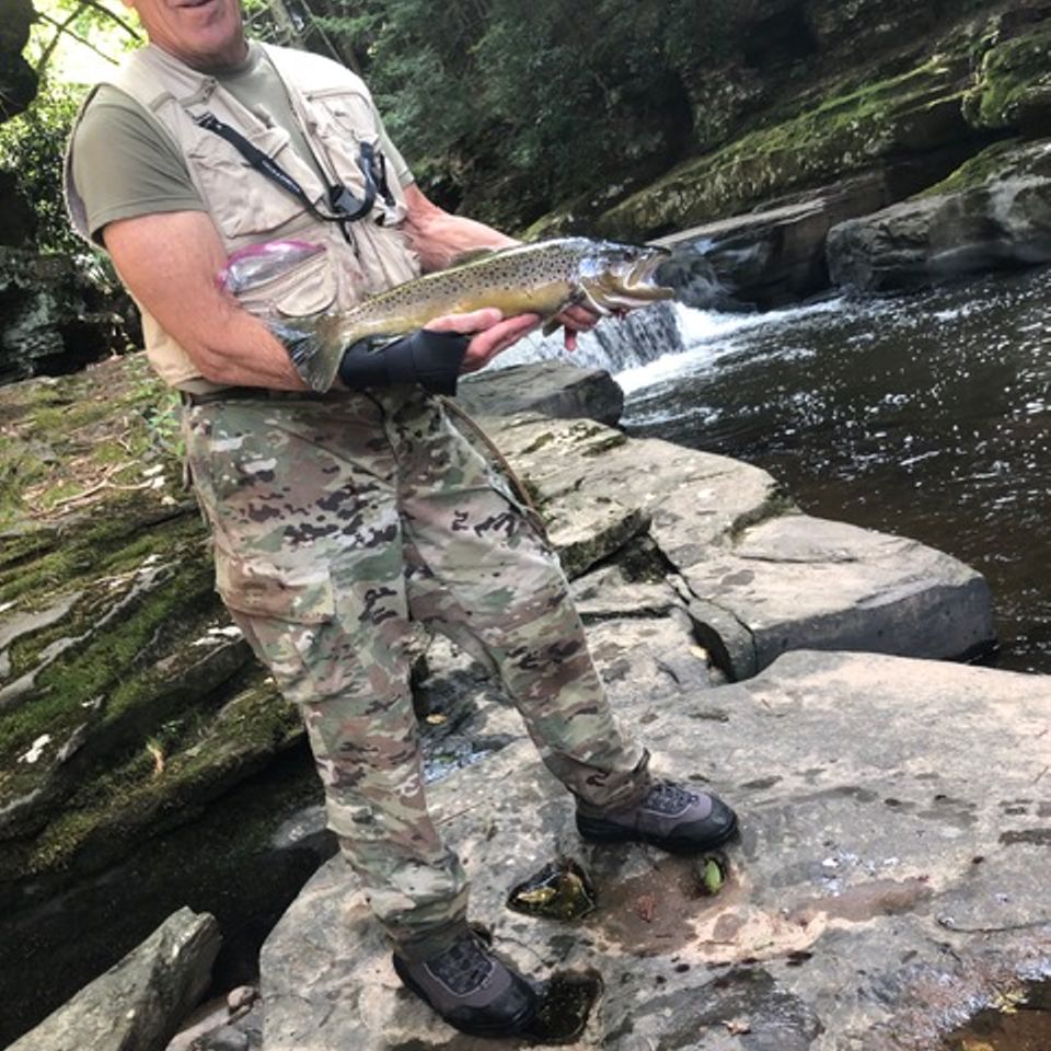 Leo Rosenberger of Lancaster, with the biggest Brown Trout ever taken by him in the Callicoon Creek, in the NY Catskills.