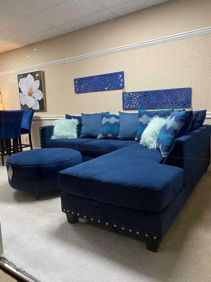 Blue sectional with ottoman