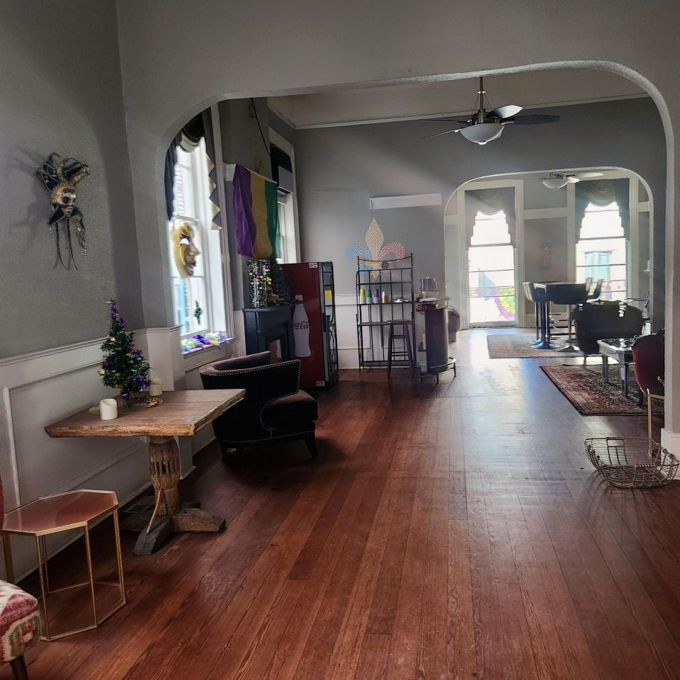 Another view of inside seating at 232 Bourbon Street balcony.