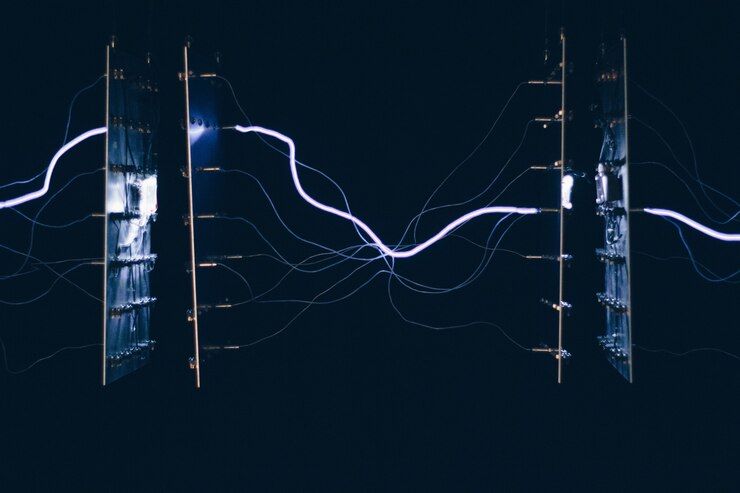 Closeup shot electrical chipsets transmitting energy through each other 181624 3425