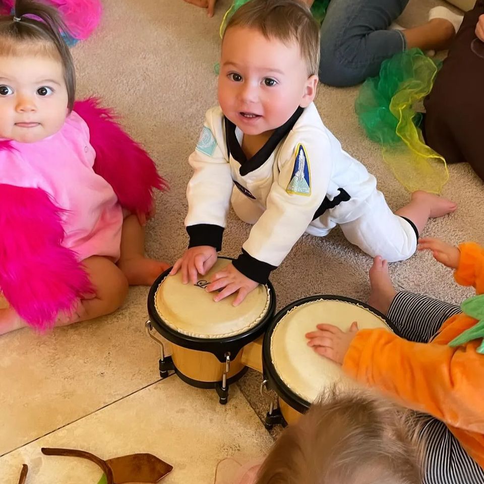 Baby with instrument