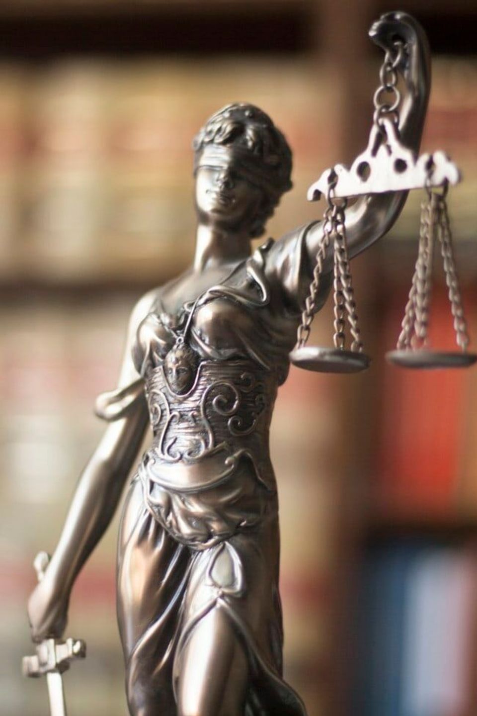 Criminal defense statue 682x1024 portrait 58674f85a403a8513852e18fc5e74e36 5e79fece3f618