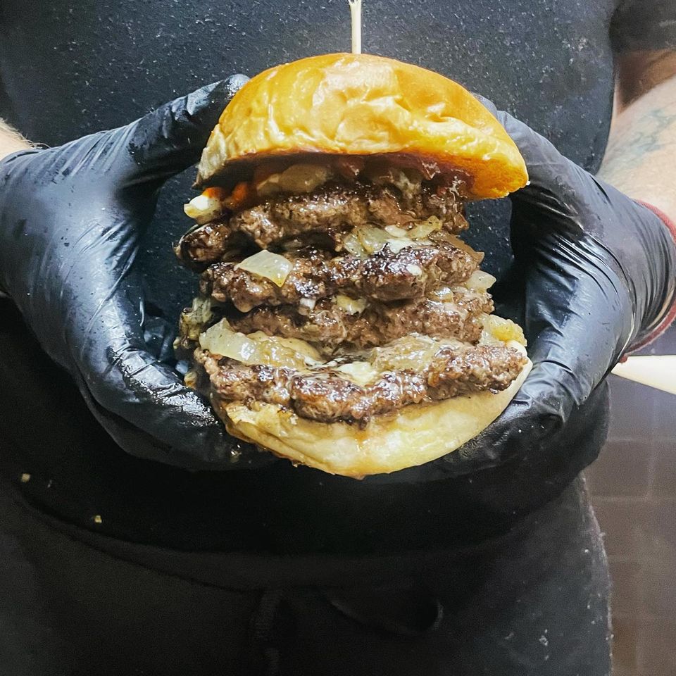 A savory 5 patty hamburger from Inferno The Restaurant in Sound Beach