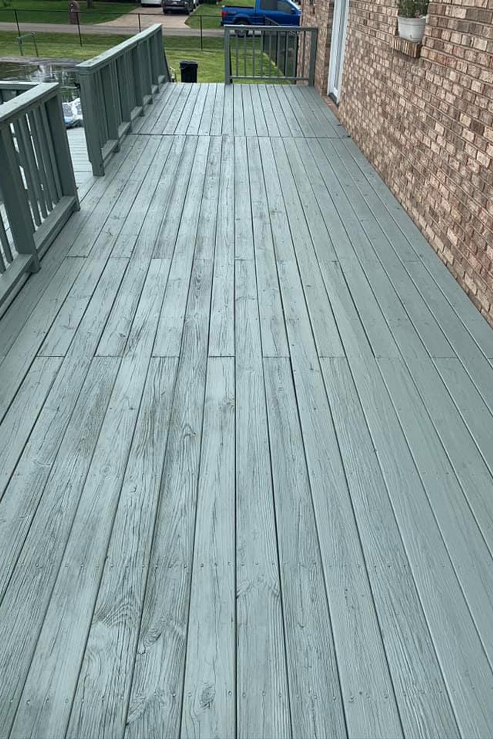Wood deck pressure washing by TLC Pressure Washing