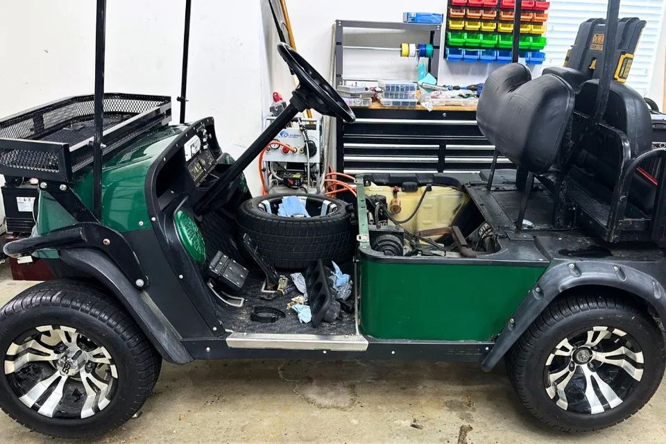 Preventative maintenance on a golf cart by Neighborhood Golf Carts in Madisonville, LA