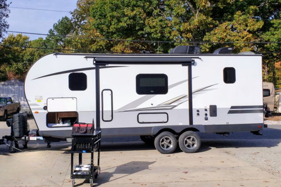 Travel Trailer being checked prior to delivery